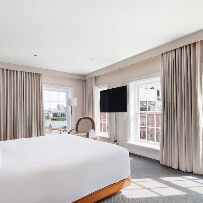 large bedroom overlooking the river