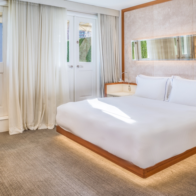 large king bed with white linen