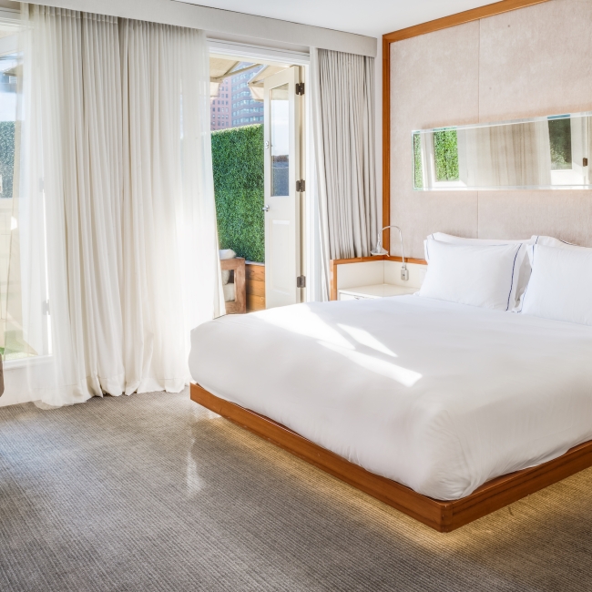 large king bed with white linen