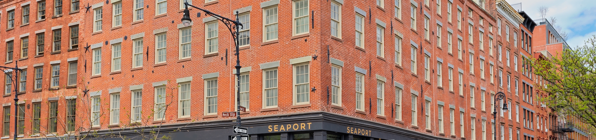 exterior of a rick facing byuilding on a corner