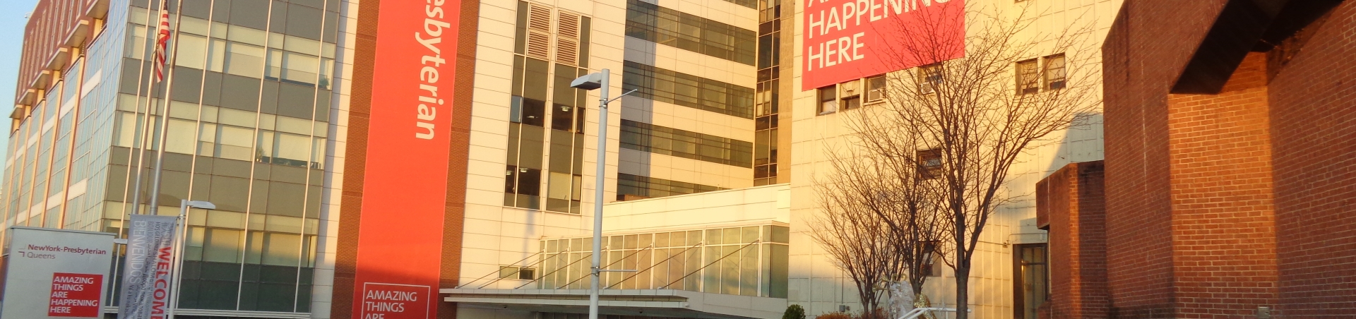 beige building with red signs and white lettering